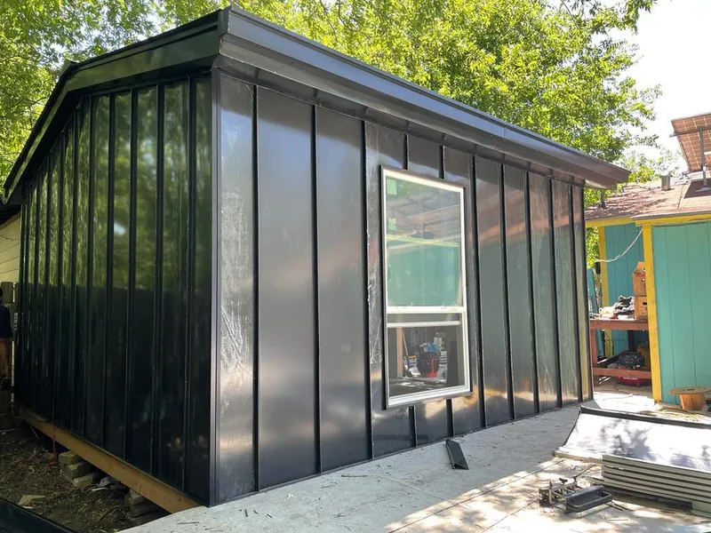 Black standing seam metal wall panels for Roof Inspection in Gunnison