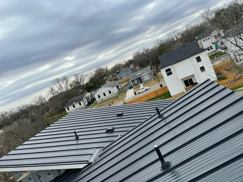 Standing seam metal roof panels with vents for Skylight Repair in Gunnison